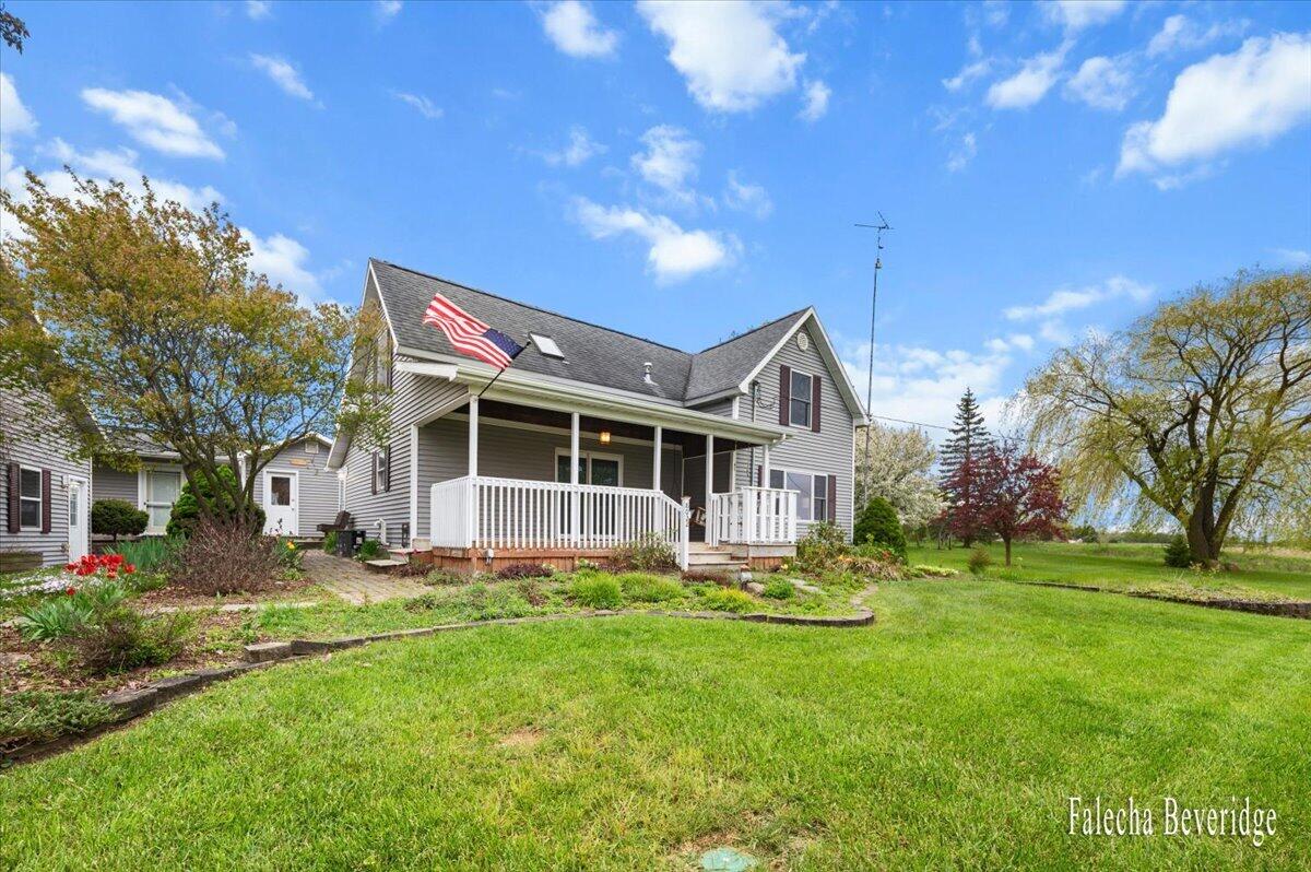 8022 East Vernon Road Clare, MI 48617 - Photo 4 of 44 Front Angle