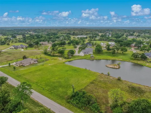 a view of a city with a lake
