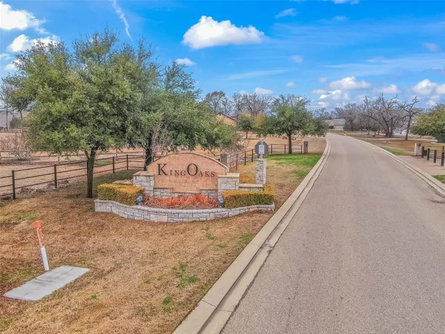 a view of a swimming pool with an outdoor seating