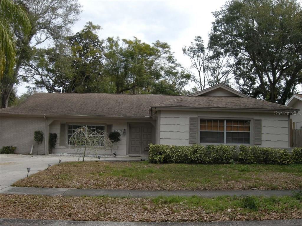 2447 Grove Ridge Drive Palm Harbor, FL 34683 - Photo 1 of 1 Nice curb appeal with a side positioned garage.