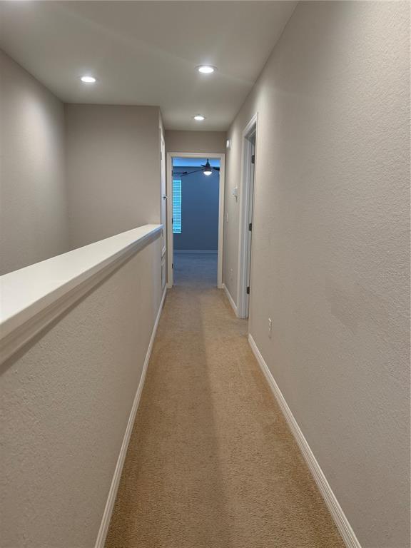4656 Vignette Way Sarasota, FL 34240 - Photo 27 of 33 a view of hallway with stairs