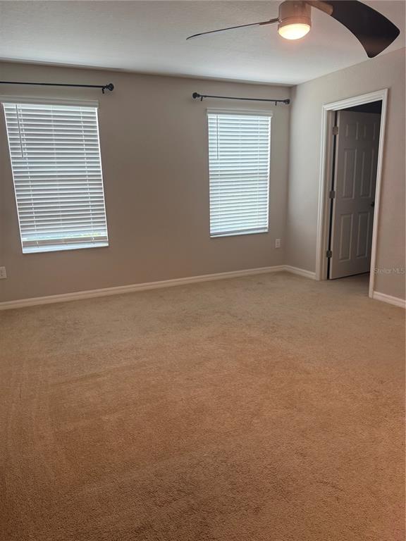 4656 Vignette Way Sarasota, FL 34240 - Photo 28 of 33 an empty room with windows