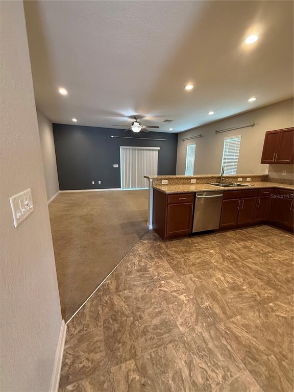 4656 Vignette Way Sarasota, FL 34240 - Photo 5 of 33 a large room with furniture