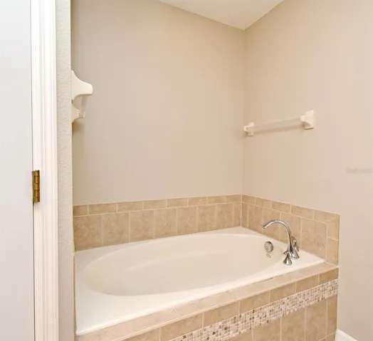 a bathroom with a bathtub