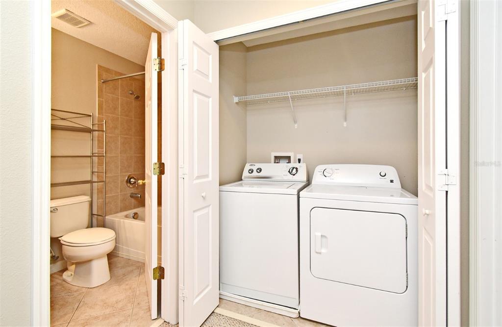 5072 Cypress Branch Point Oviedo, FL 32765 - Photo 22 of 23 a view of bathroom with a washer and dryer