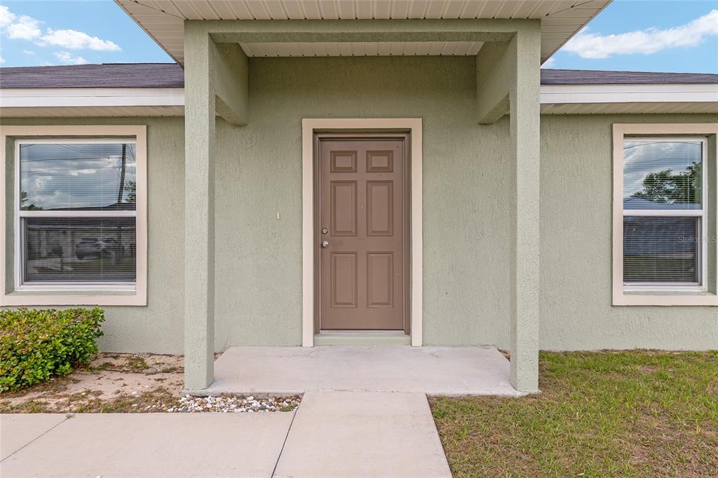 22 Juniper Loop Circle Ocala, FL 34480 - Photo 11 of 53 a front view of a house