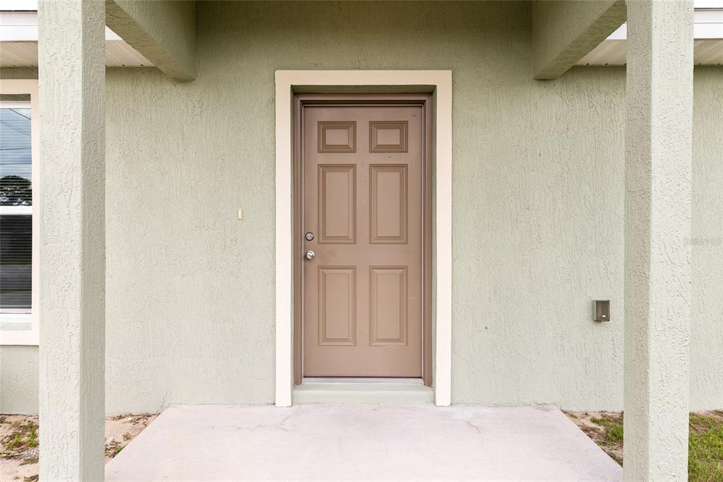 22 Juniper Loop Circle Ocala, FL 34480 - Photo 12 of 53 a view of a hallway with closet