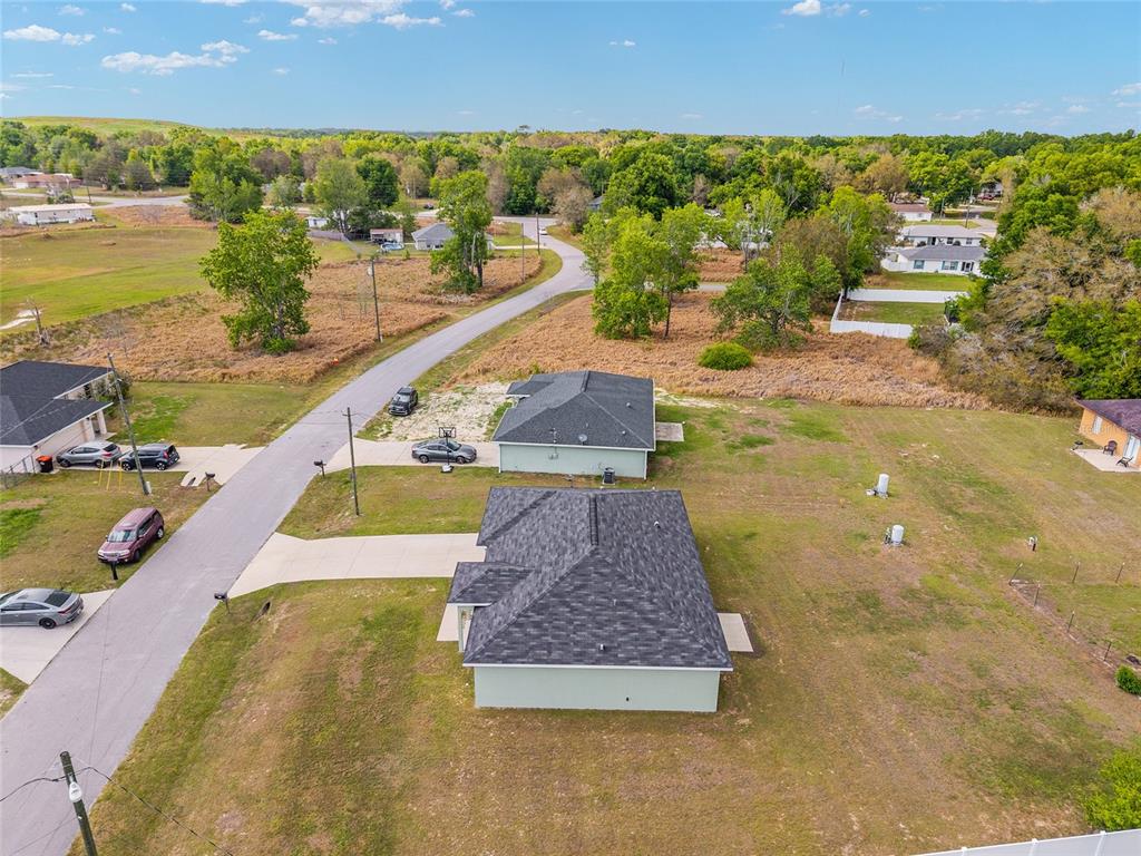 22 Juniper Loop Circle Ocala, FL 34480 - Photo 52 of 53 a view of a swimming pool and lake