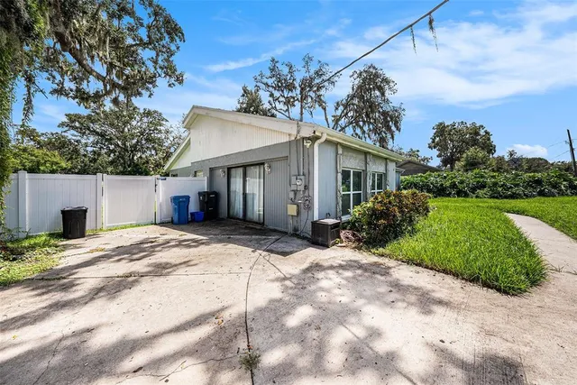 a house with yard in front of it