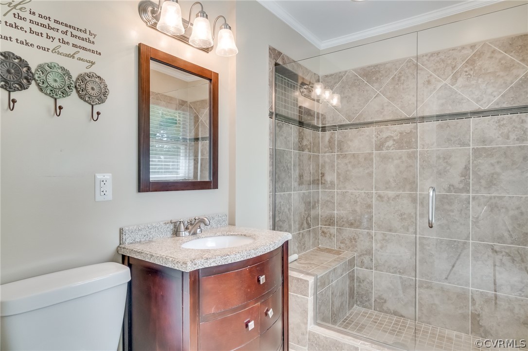 7512 Tangle Ridge Drive Mechanicsville, VA 23111 - Photo 13 of 23 a bathroom with a sink toilet and shower