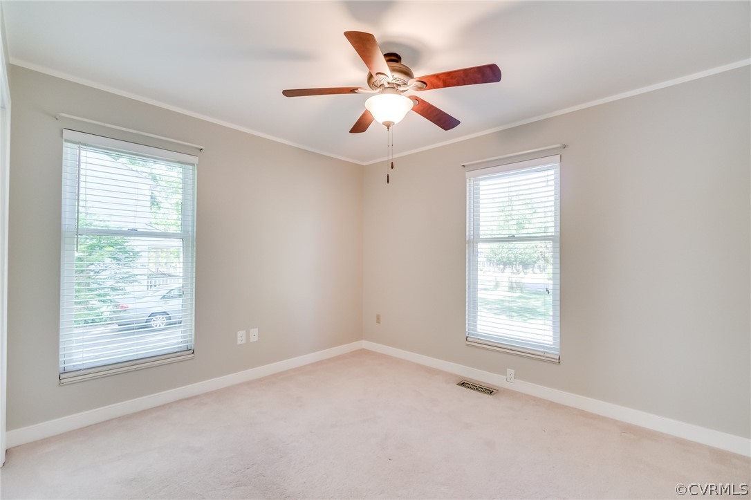 7512 Tangle Ridge Drive Mechanicsville, VA 23111 - Photo 14 of 23 an empty room with ceiling fan and window