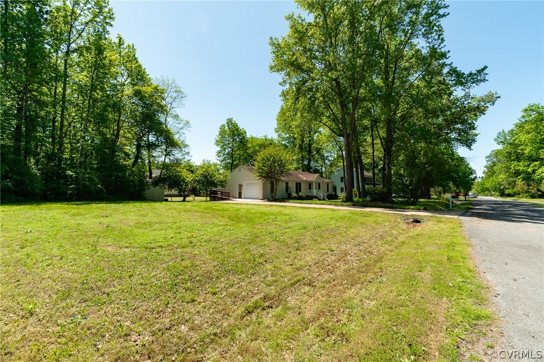 7512 Tangle Ridge Drive Mechanicsville, VA 23111 - Photo 18 of 23 a view of a swimming pool with yard