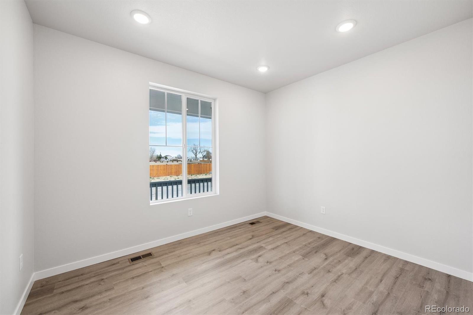 1382 Farmstead Street Brighton, CO 80601 - Photo 5 of 30