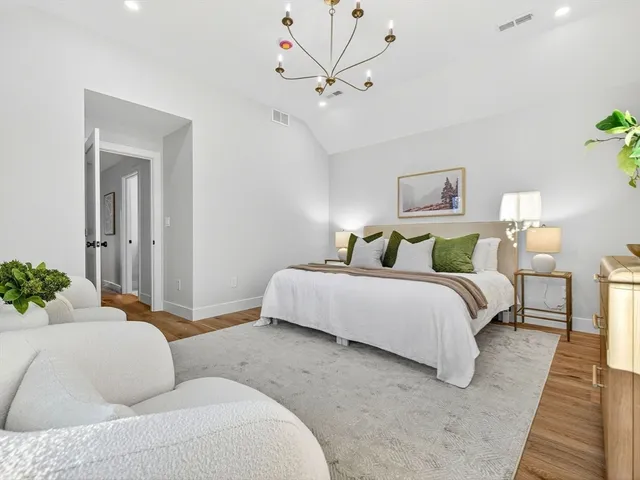 a bathroom with a sink a vanity and a mirror