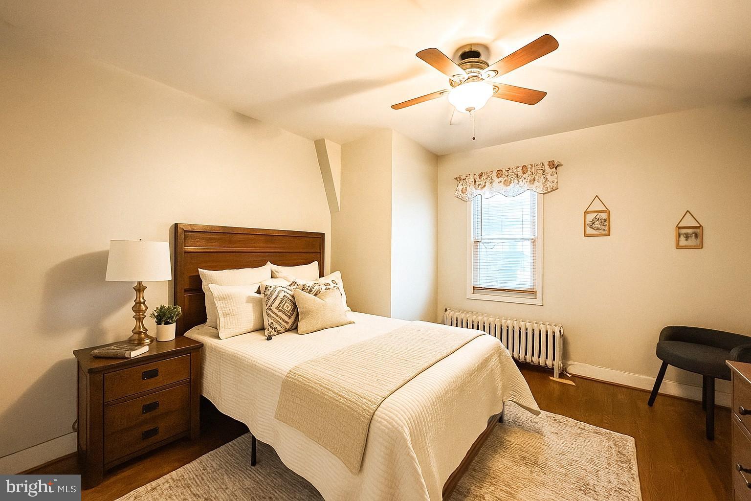 12812 New Row Rd N West Mount Savage, MD 21545 - Photo 22 of 32 a bedroom with a bed and window