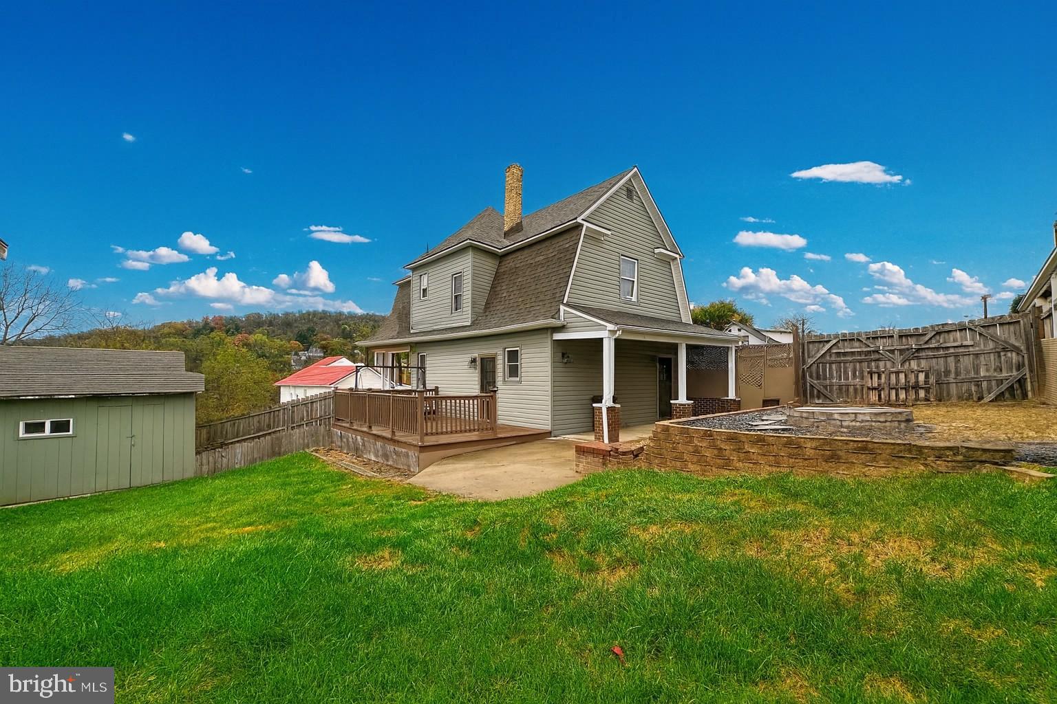 12812 New Row Rd N West Mount Savage, MD 21545 - Photo 29 of 32 a view of a house with a yard porch and sitting area