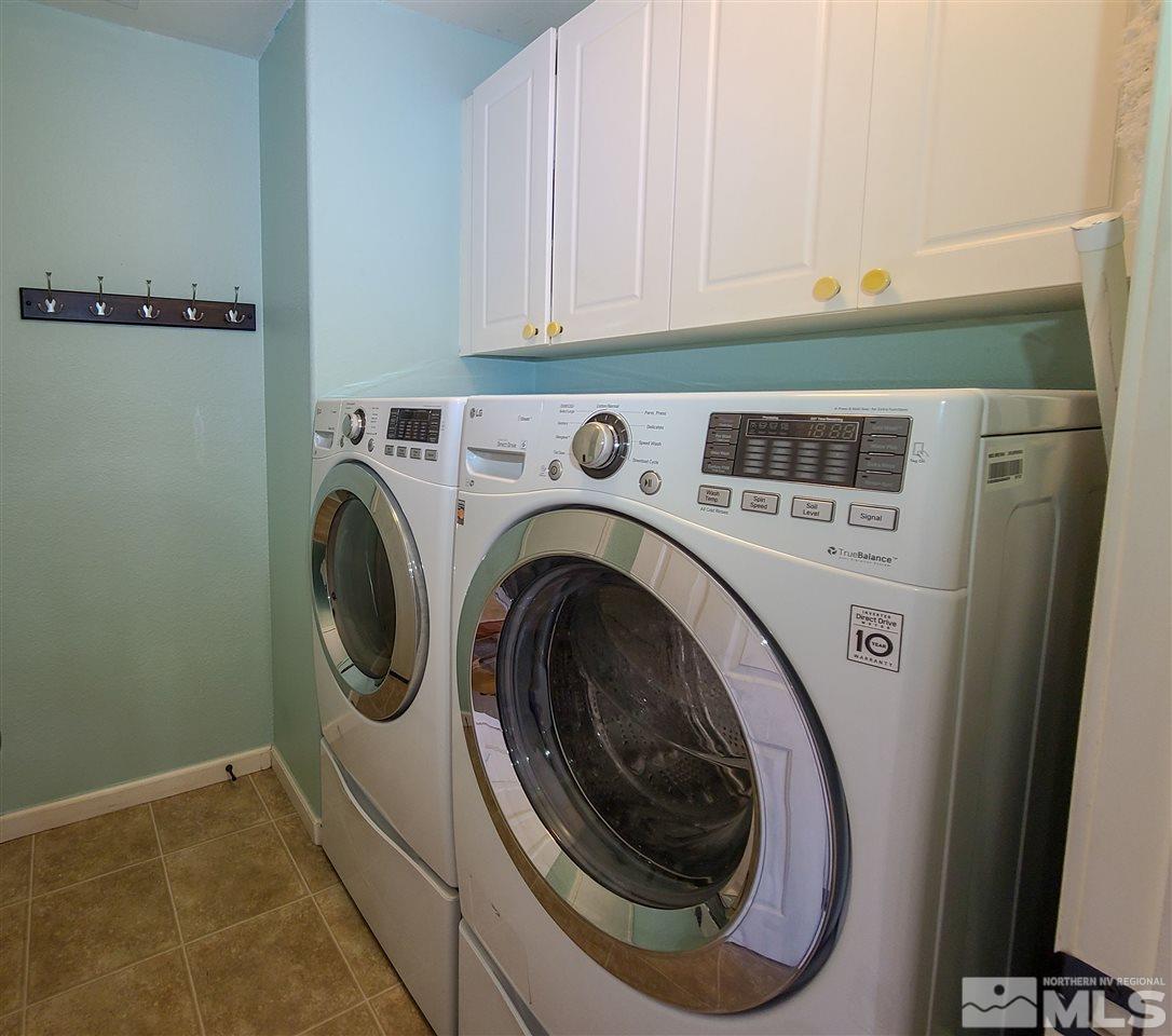 1736 River Gorge Court Reno, NV 89521 - Photo 12 of 23 a utility room with dryer and washer