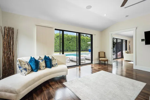 a spacious bathroom with a tub sink shower and mirror