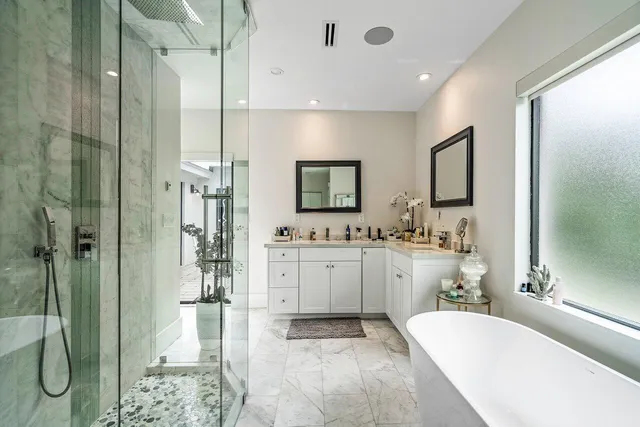 a view of a swimming pool with lounge chair