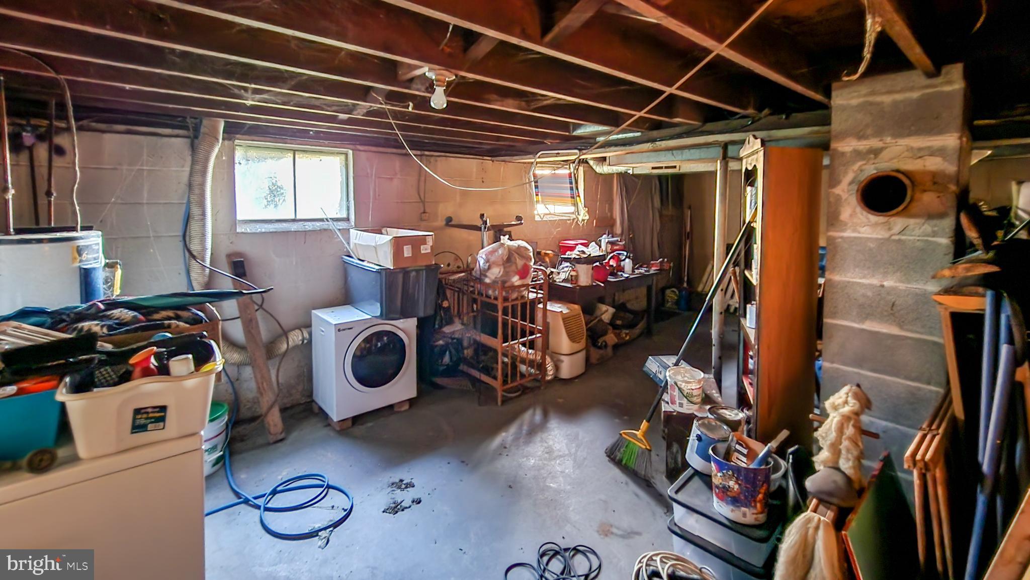 13614 Oldtown Road Southeast Cumberland, MD 21502 - Photo 18 of 30 a view of a storage room with washer and dryer