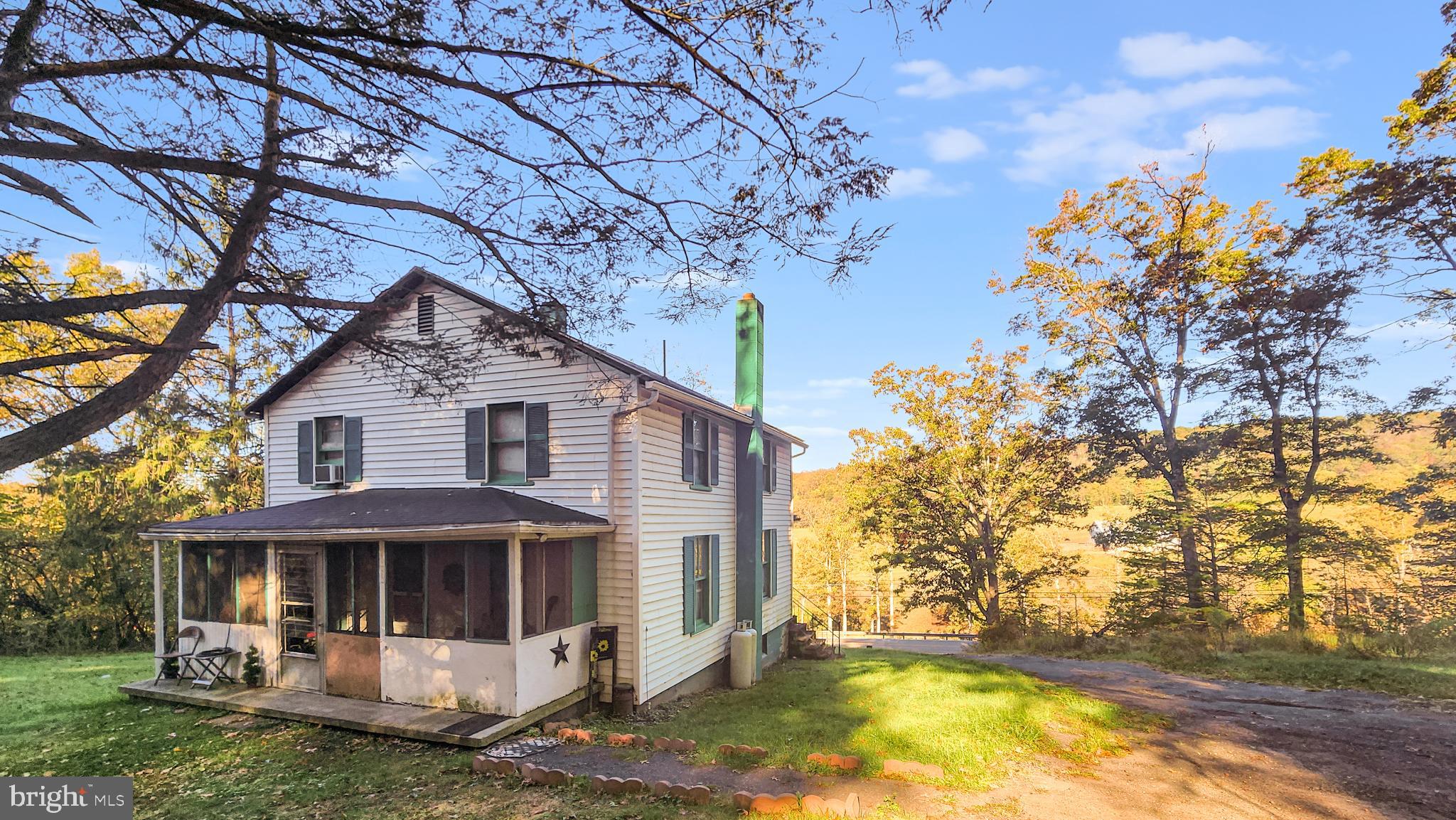 13614 Oldtown Road Southeast Cumberland, MD 21502 - Photo 2 of 30 a front view of a house with a yard