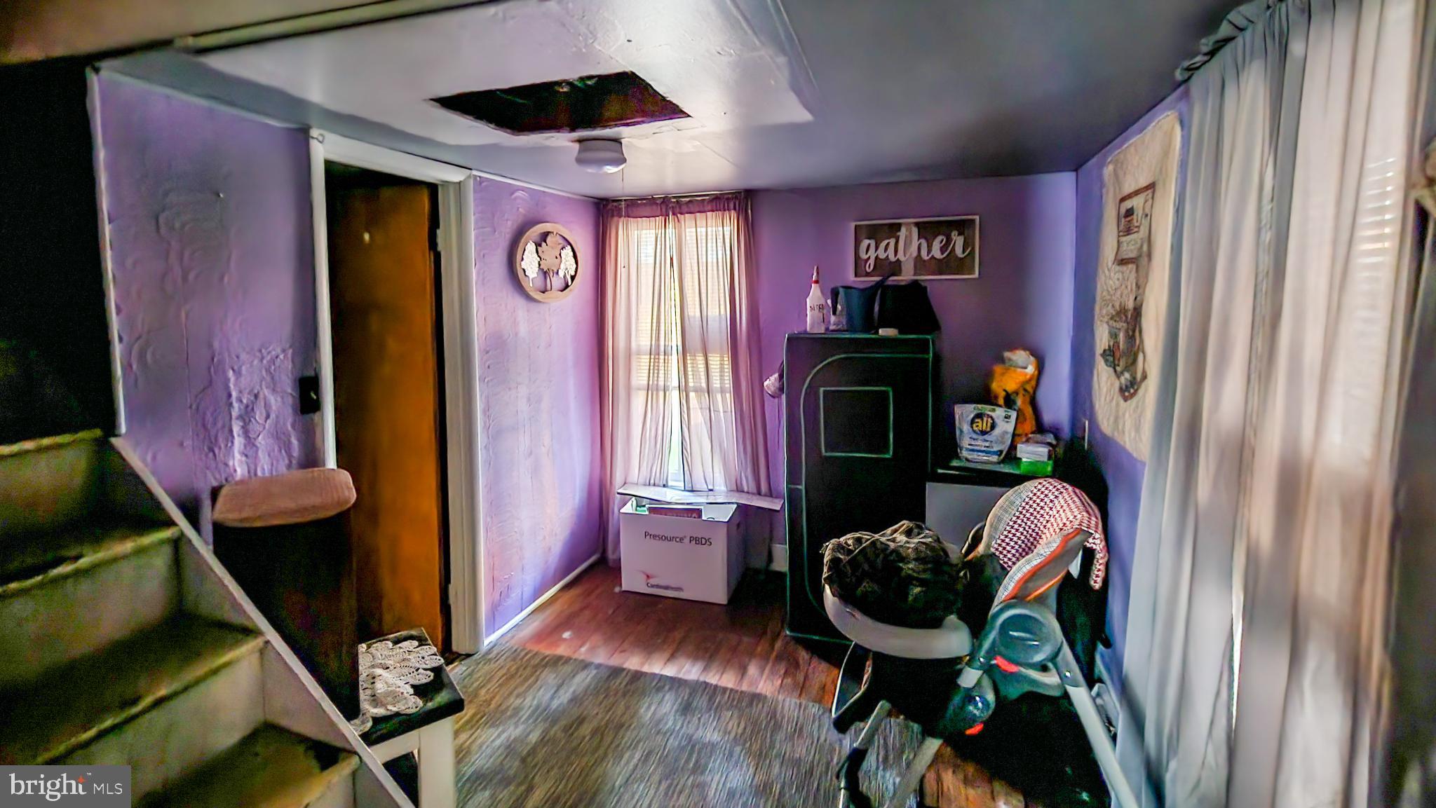 13614 Oldtown Road Southeast Cumberland, MD 21502 - Photo 8 of 30 a living room with furniture and wooden floor