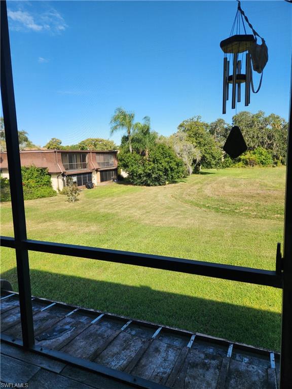 7141 Dell Road, Unit 3 New Port Richey, FL 34653 - Photo 12 of 12 a view of a yard with an outdoor space