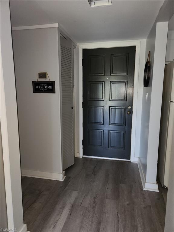 7141 Dell Road, Unit 3 New Port Richey, FL 34653 - Photo 2 of 12 a view of empty room with wooden floor