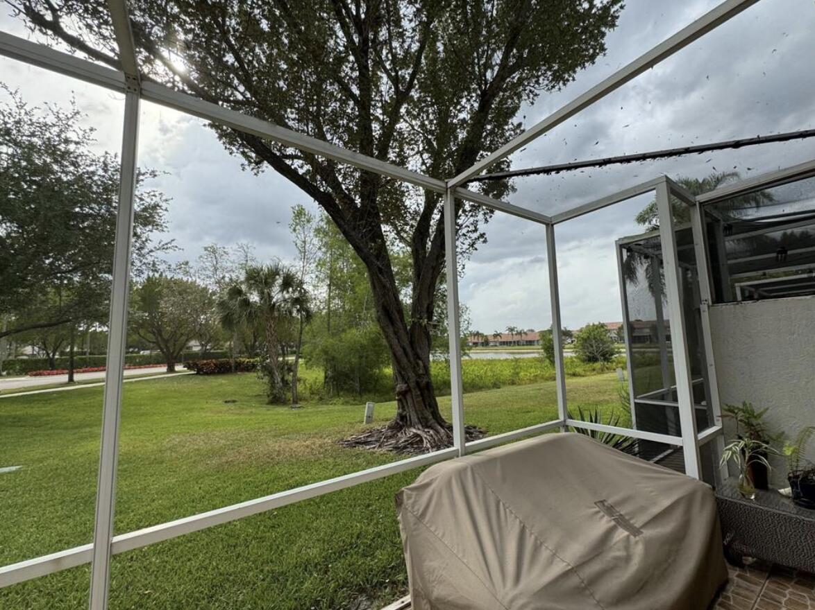 21235 Vía Eden Boca Raton, FL 33433 - Photo 2 of 20 View of Lake from patio