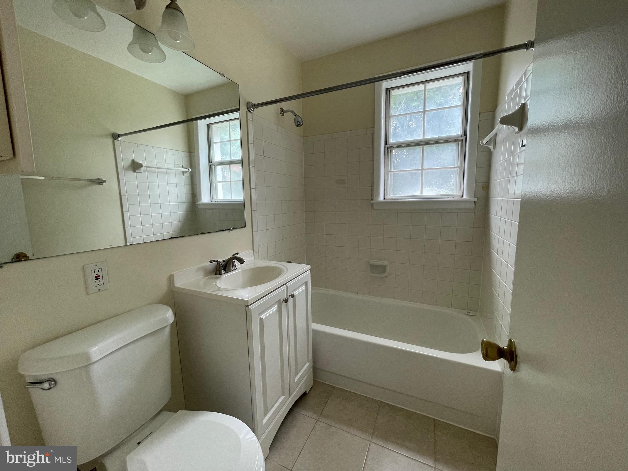 2515 South Walter Reed Drive, Unit D Arlington, VA 22206 - Photo 7 of 10 Updated bathroom