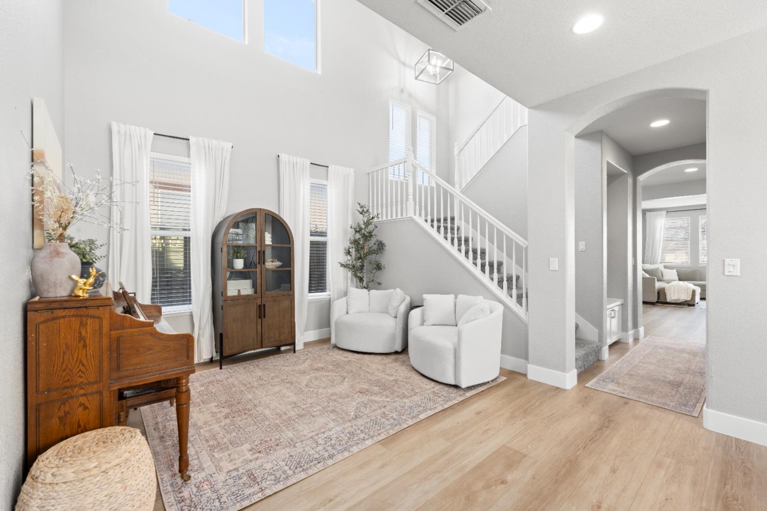 11749 Dionysus Way Rancho Cordova, CA 95742 - Photo 12 of 56 a living room with furniture and wooden floor