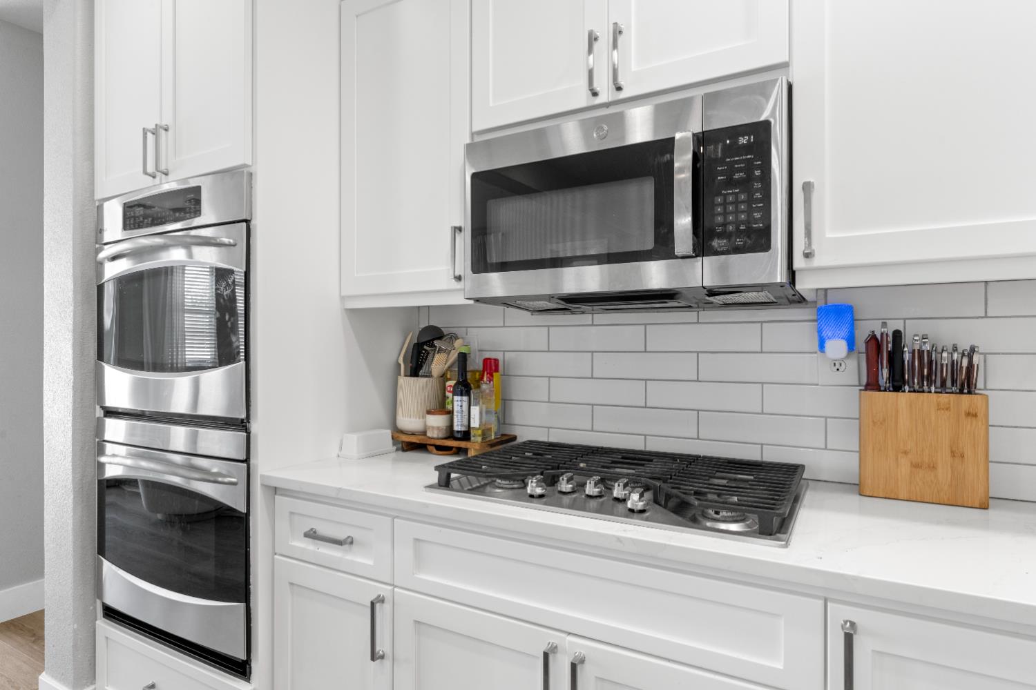 11749 Dionysus Way Rancho Cordova, CA 95742 - Photo 15 of 56 a kitchen with microwave cabinets and stainless steel appliances