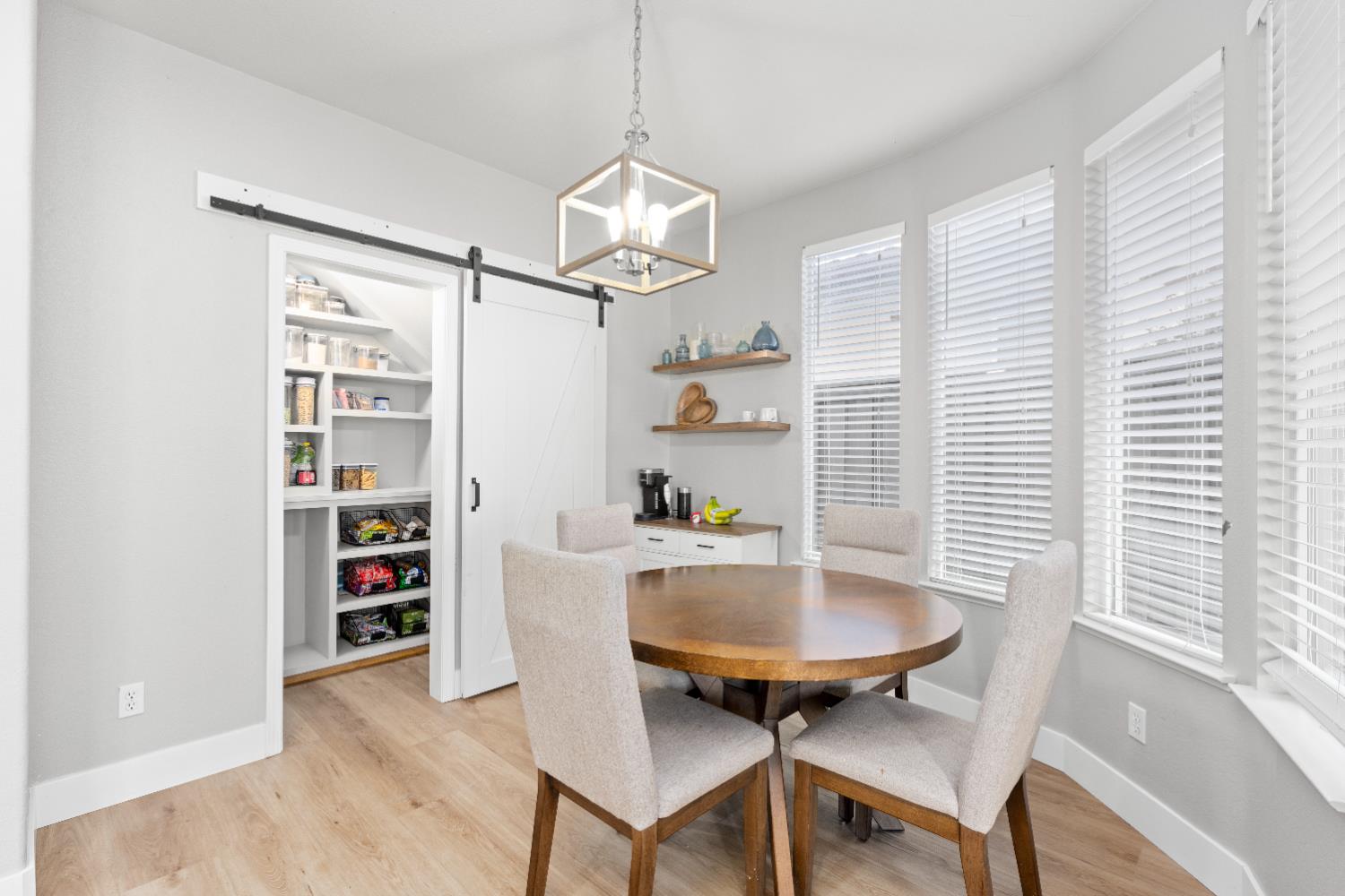 11749 Dionysus Way Rancho Cordova, CA 95742 - Photo 20 of 56 a view of a dining room with furniture window and wooden floor