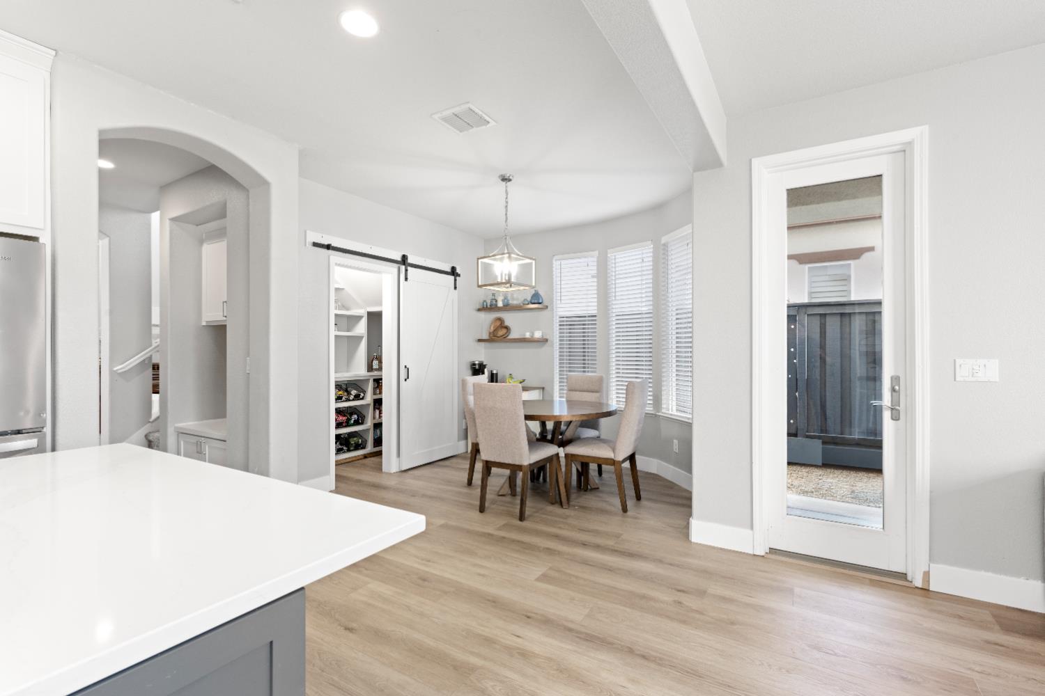 11749 Dionysus Way Rancho Cordova, CA 95742 - Photo 21 of 56 a view of a kitchen and dining room