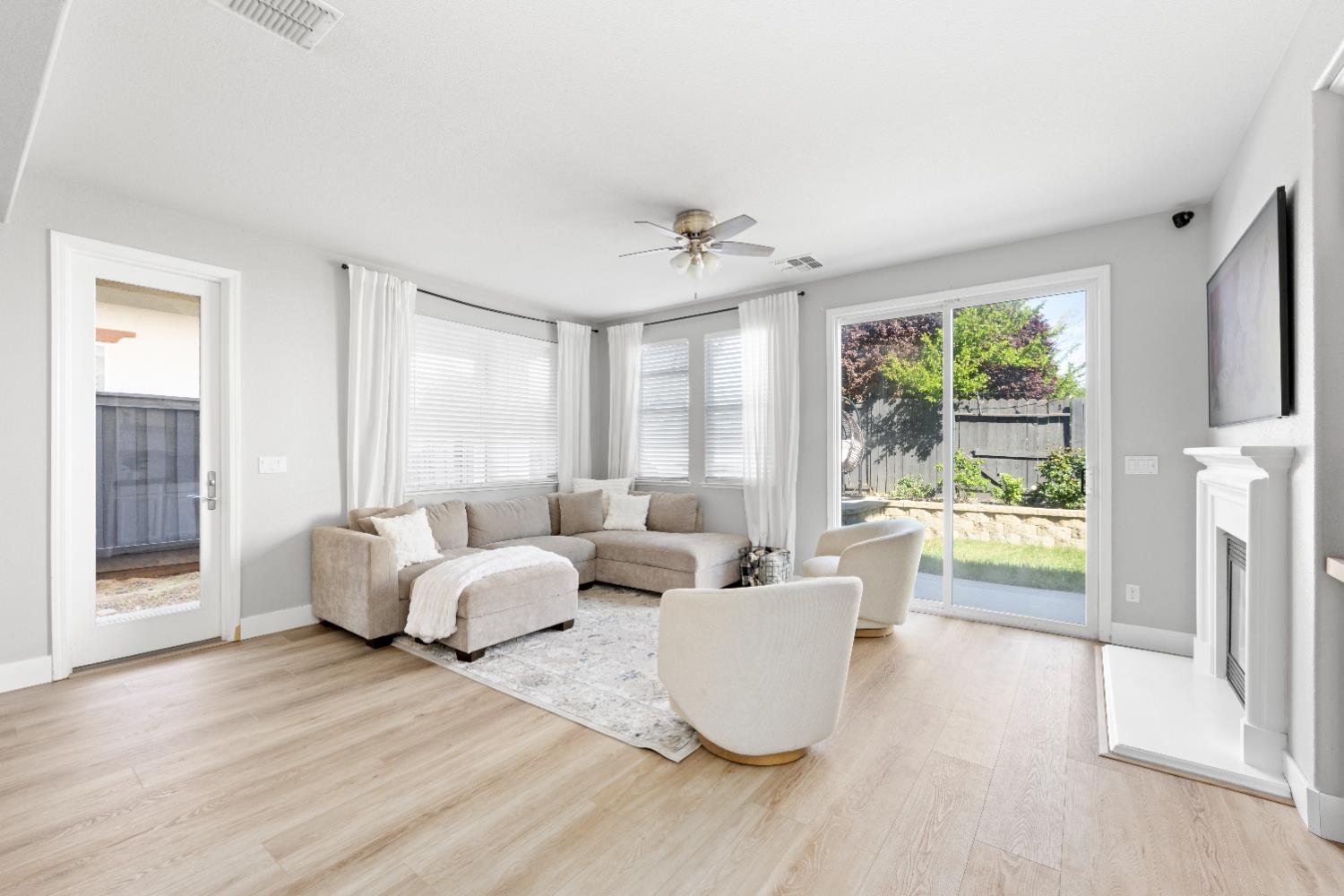11749 Dionysus Way Rancho Cordova, CA 95742 - Photo 25 of 56 a living room with furniture and a large window