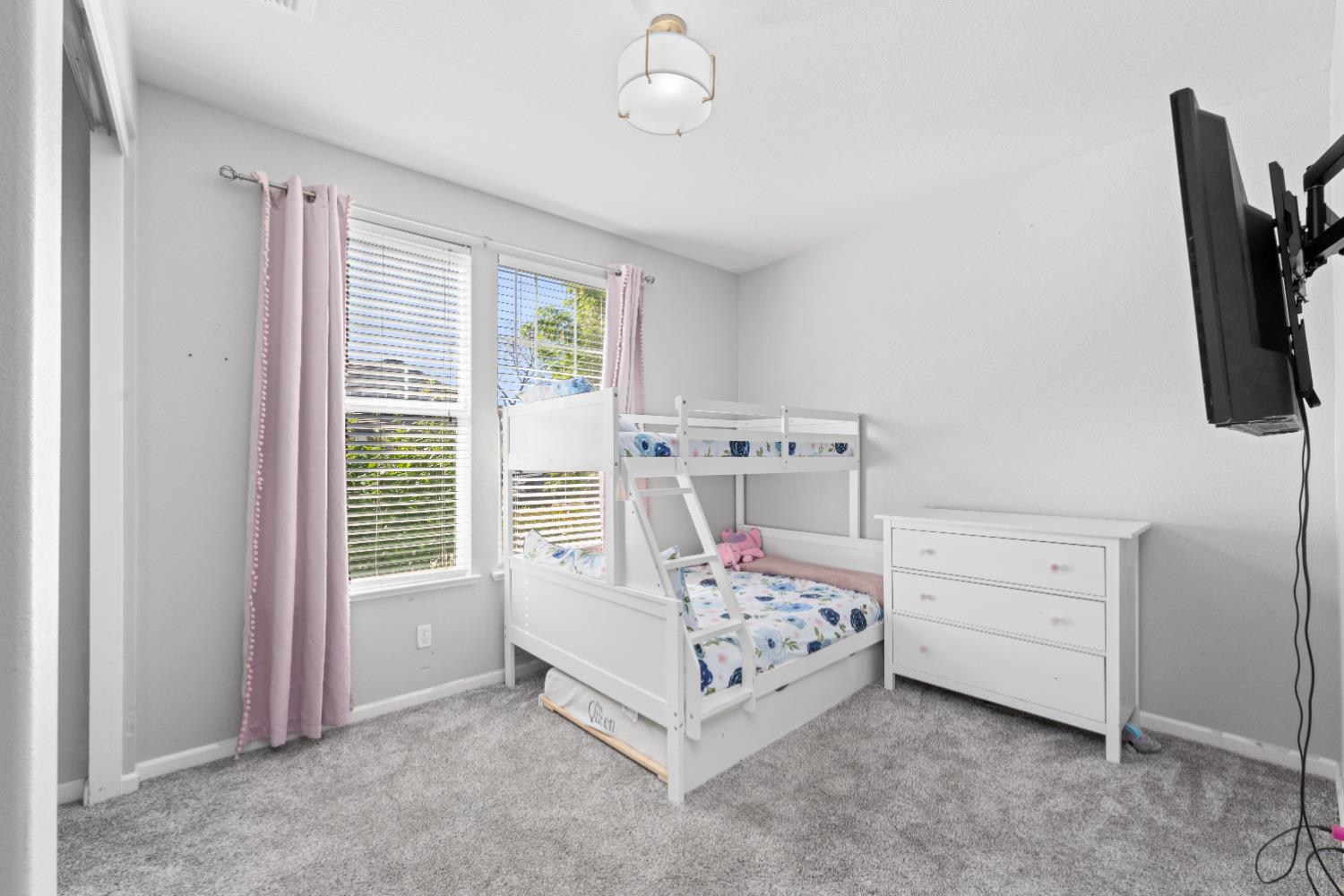 11749 Dionysus Way Rancho Cordova, CA 95742 - Photo 4 of 56 a bed room with a bed a window and television