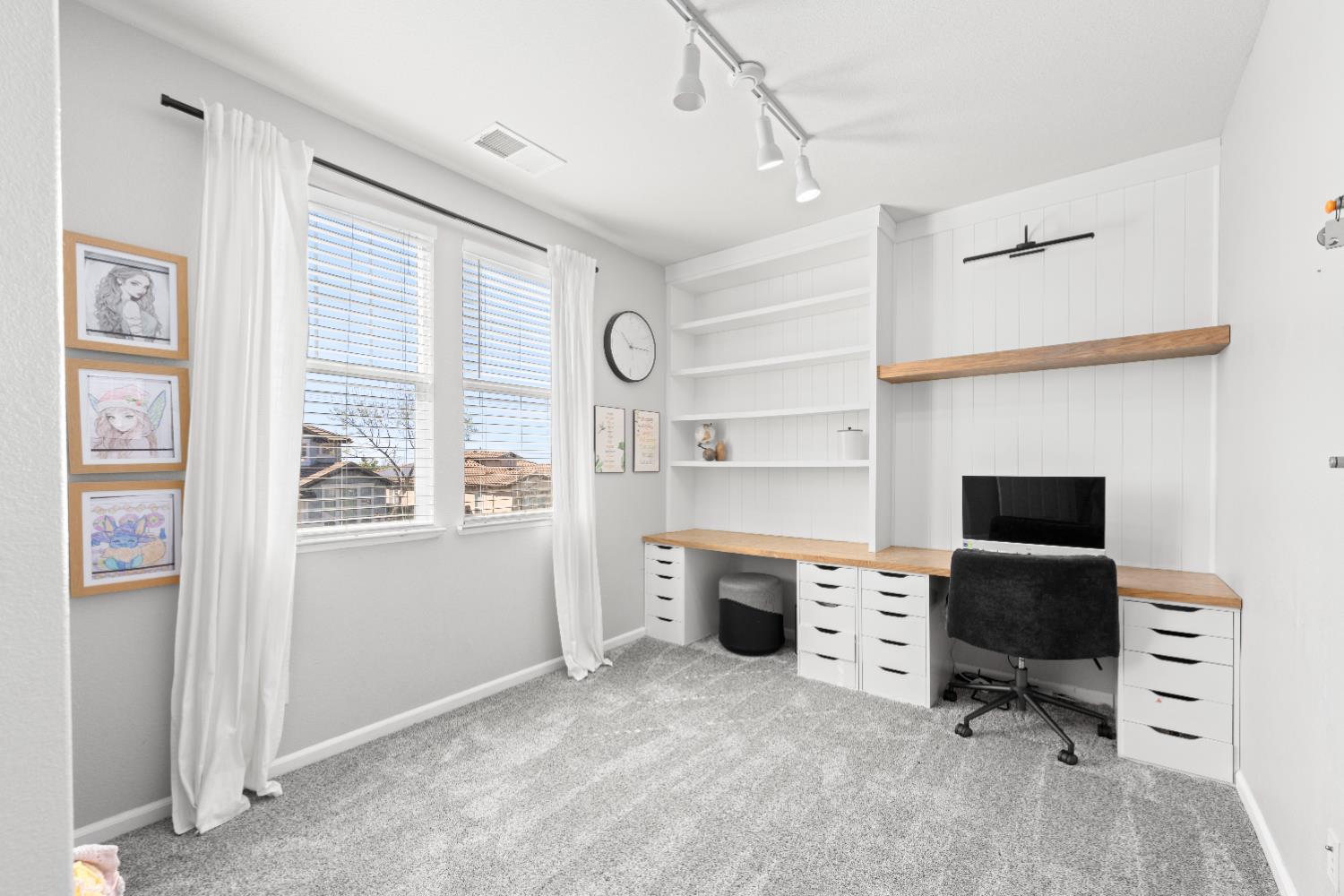 11749 Dionysus Way Rancho Cordova, CA 95742 - Photo 42 of 56 a view of a workspace with furniture and a window