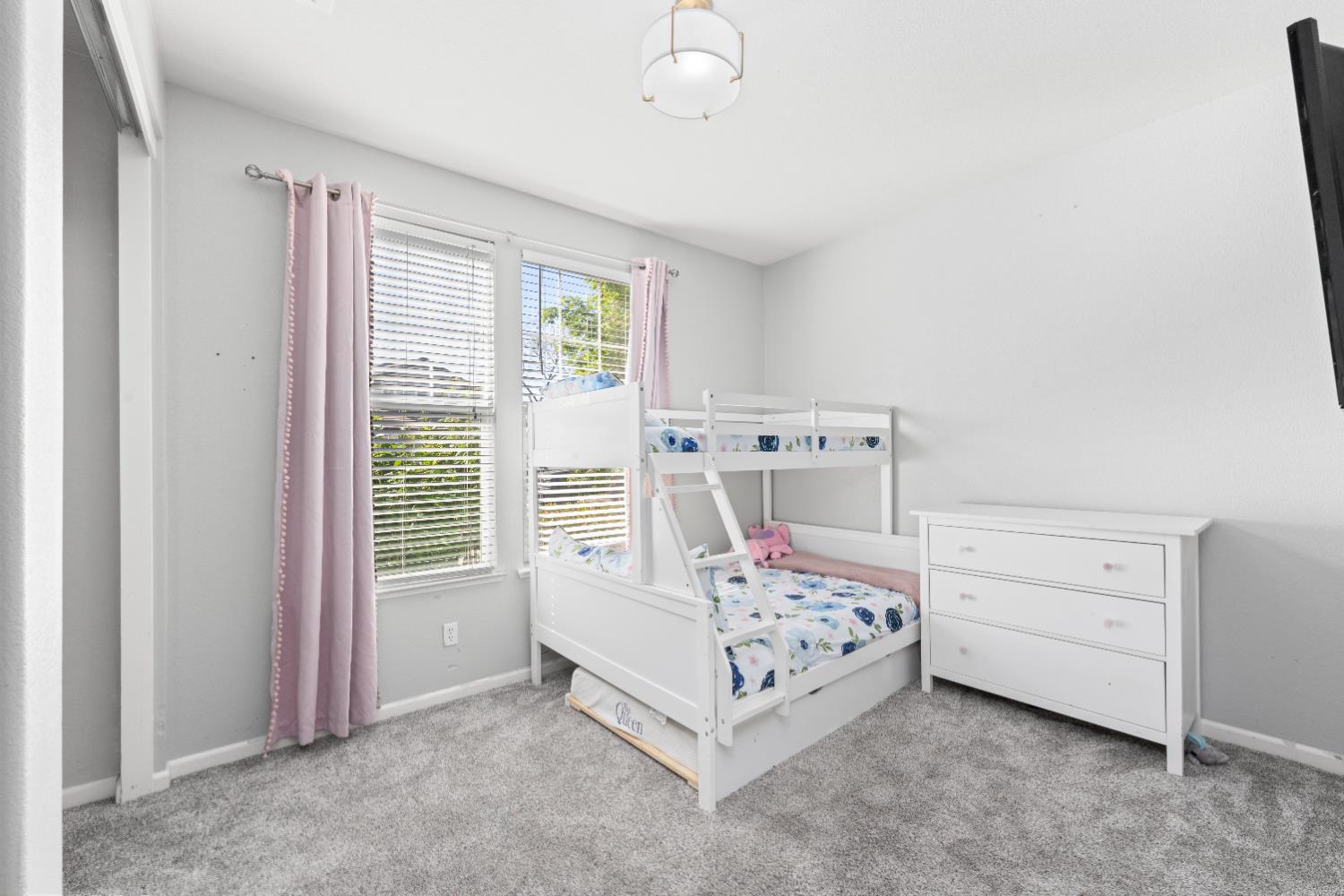 11749 Dionysus Way Rancho Cordova, CA 95742 - Photo 5 of 56 a bed room with a bed and a window