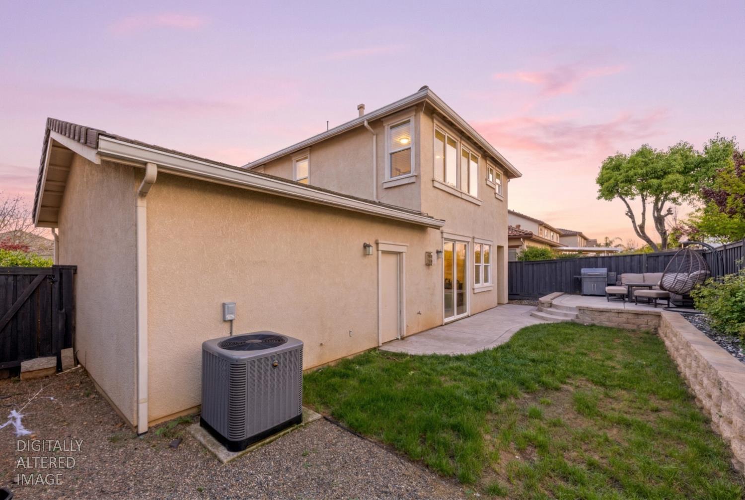 11749 Dionysus Way Rancho Cordova, CA 95742 - Photo 55 of 56 a view of a backyard with plants and a patio