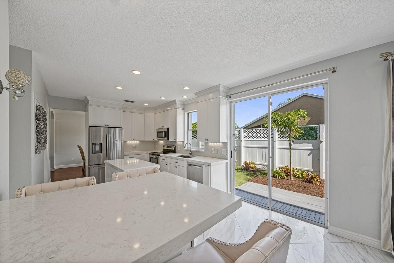 18860 La Costa Lane Boca Raton, FL 33496 - Photo 16 of 49 Slider to Patio