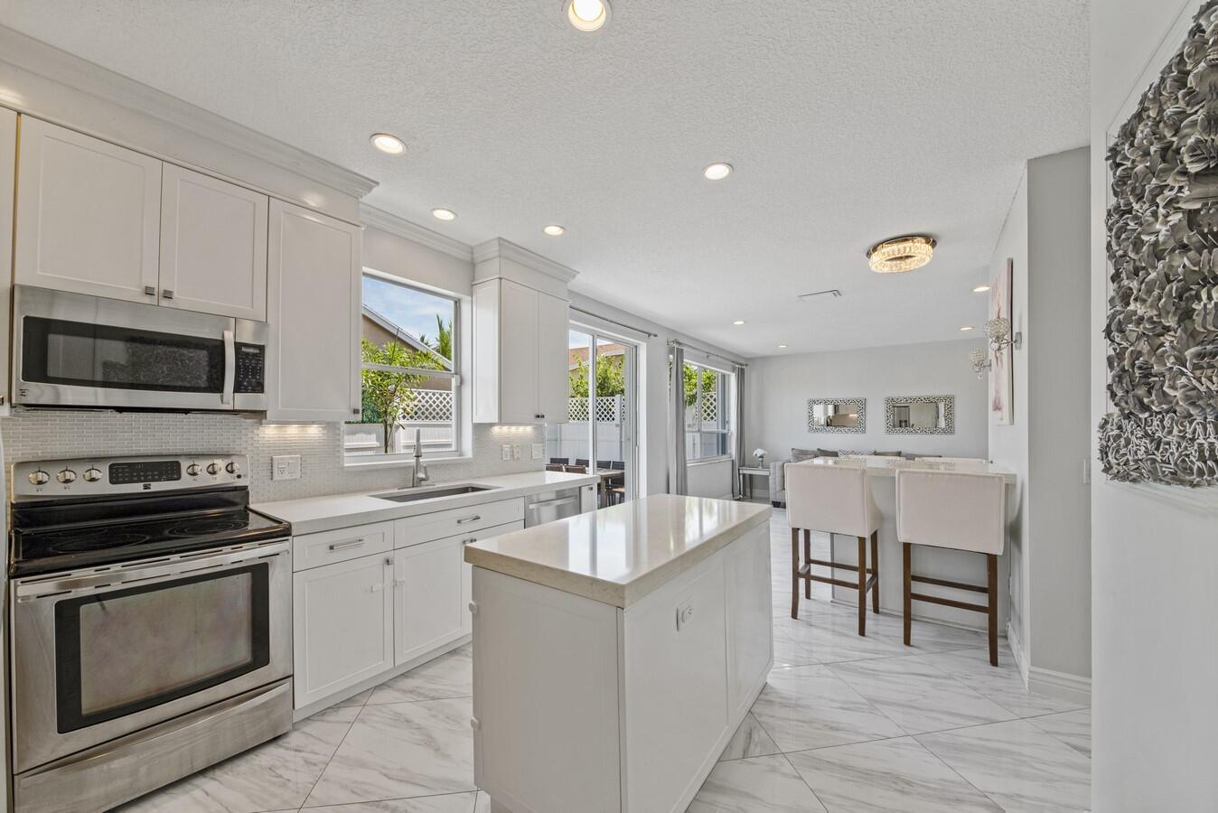 18860 La Costa Lane Boca Raton, FL 33496 - Photo 10 of 49 Center Island