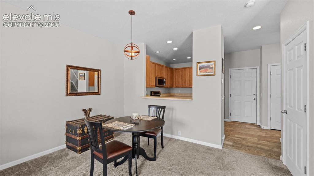 4023 Diamond Ridge View Colorado Springs, CO 80918 - Photo 7 of 31 a view of a dining room with furniture
