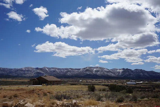 a view of lake with mountain