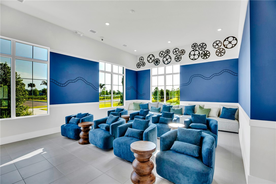 3453 Trinity Circle Fort Pierce, FL 34945 - Photo 33 of 36 a living room with furniture and a large window