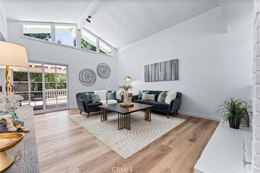 29 Bethany Drive Irvine, CA 92603 - Photo 12 of 44 a living room with furniture and wooden floor