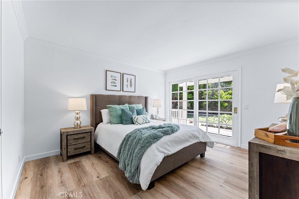 29 Bethany Drive Irvine, CA 92603 - Photo 20 of 44 a bedroom with a bed and a window