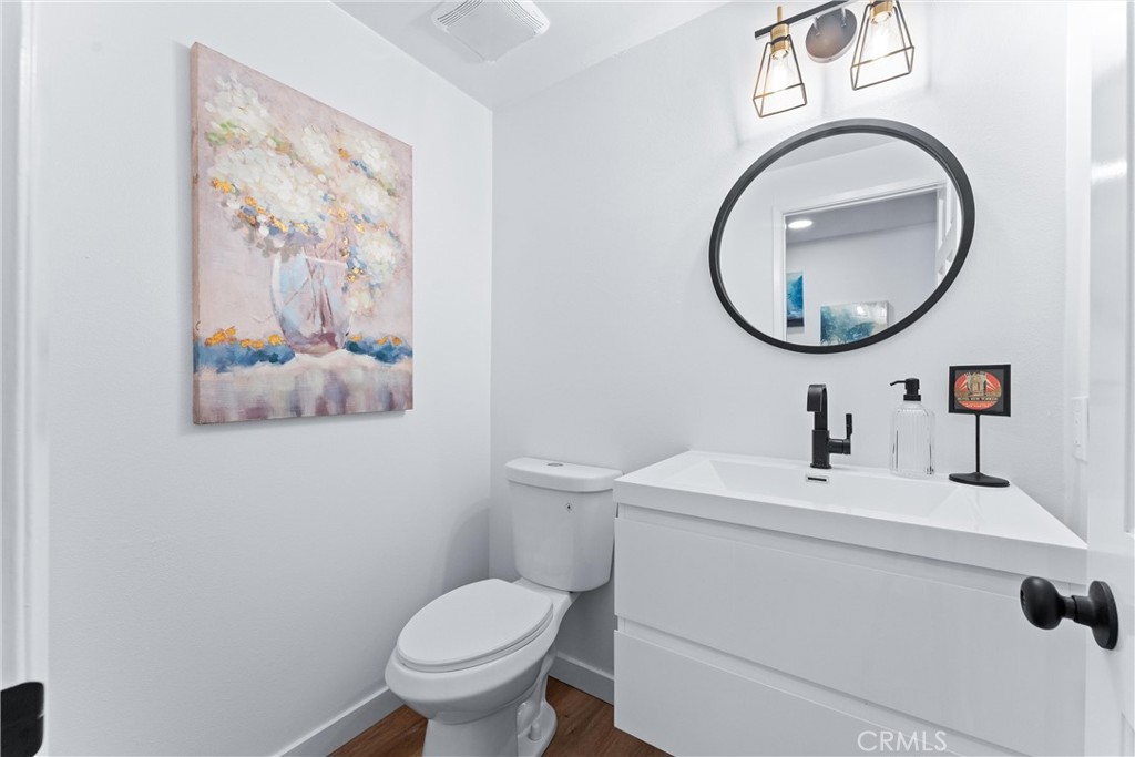 29 Bethany Drive Irvine, CA 92603 - Photo 21 of 44 a bathroom with a toilet a sink and a mirror
