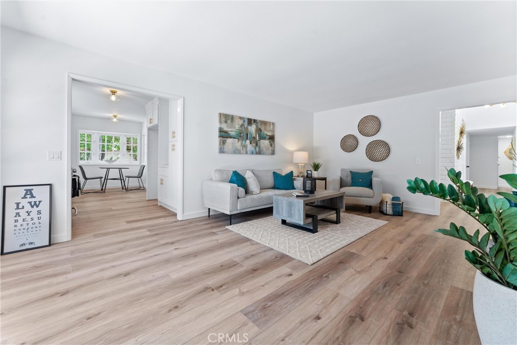 29 Bethany Drive Irvine, CA 92603 - Photo 22 of 44 a living room with furniture and wooden floor