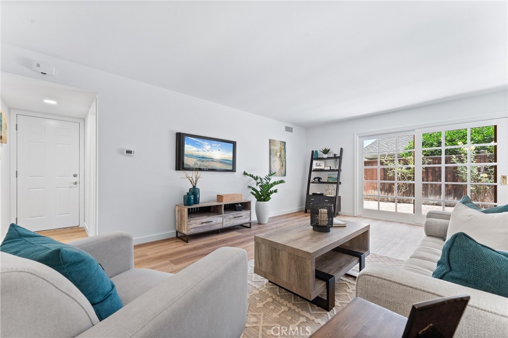 29 Bethany Drive Irvine, CA 92603 - Photo 23 of 44 a living room with furniture and a window