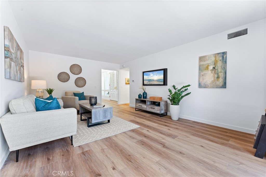 29 Bethany Drive Irvine, CA 92603 - Photo 24 of 44 a living room with furniture and a flat screen tv